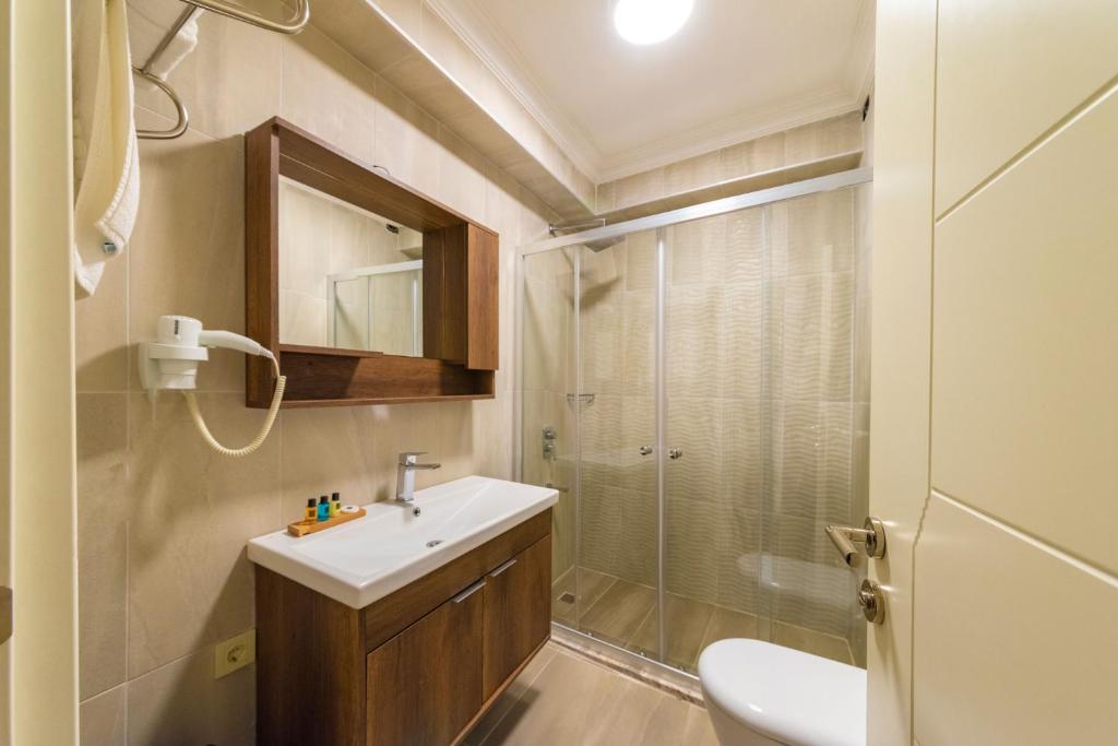 Koupelna v ubytování Joy Suites
