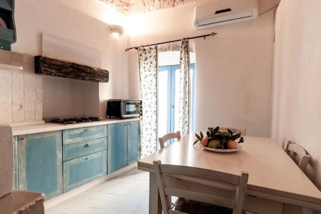 Una cocina o zona de cocina en Le Piccole Case Bianche