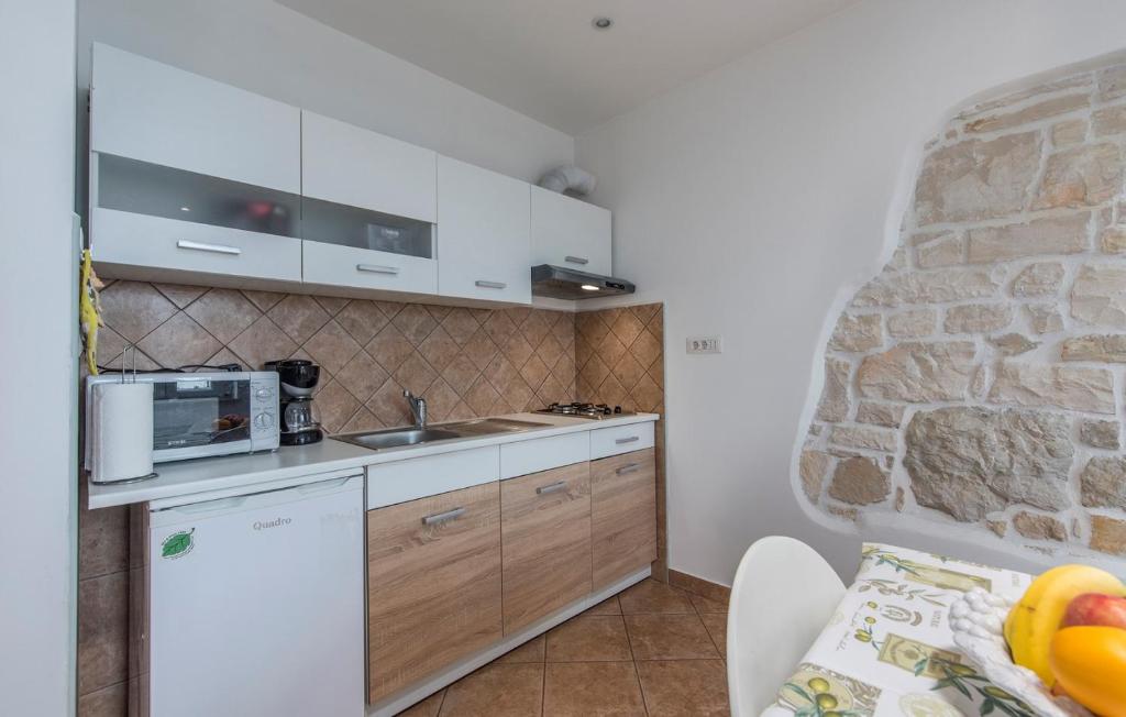Kuchyň nebo kuchyňský kout v ubytování Apartment Complex Iris