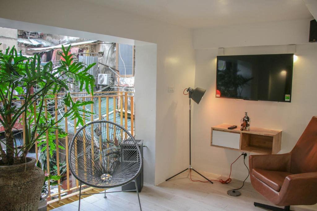 TV a/nebo společenská místnost v ubytování Hanoi Banana Hostel