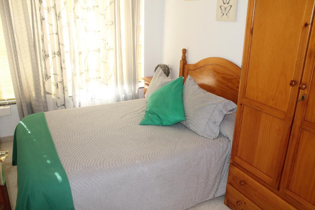 Postel nebo postele na pokoji v ubytování La Posada de Mijas