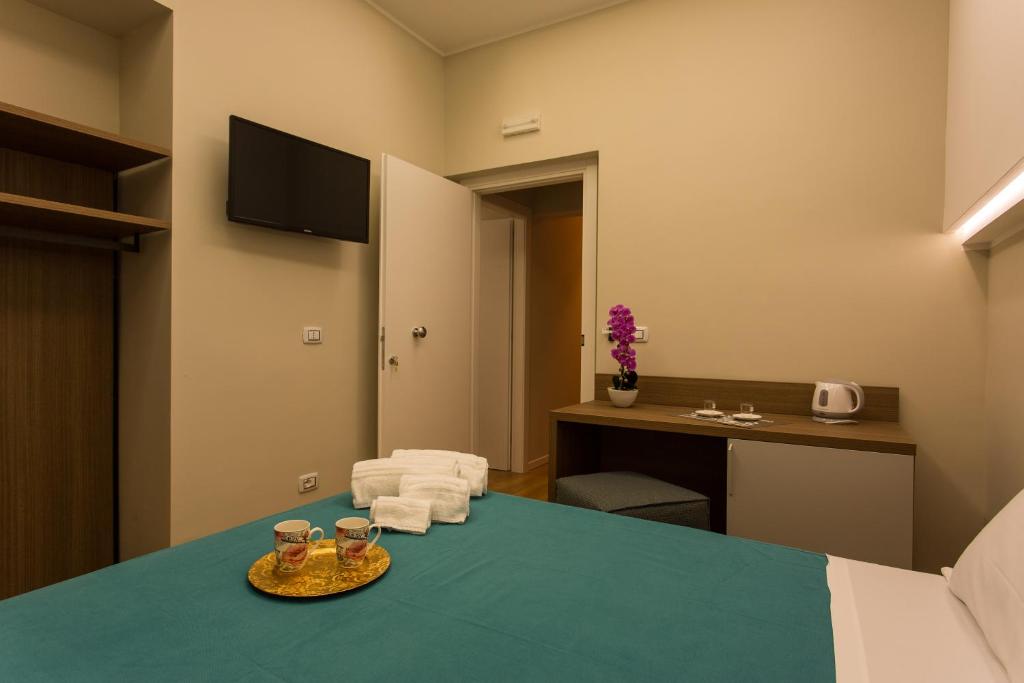Posteľ alebo postele v izbe v ubytovaní Le Affacciate Bruzie Home Guest House