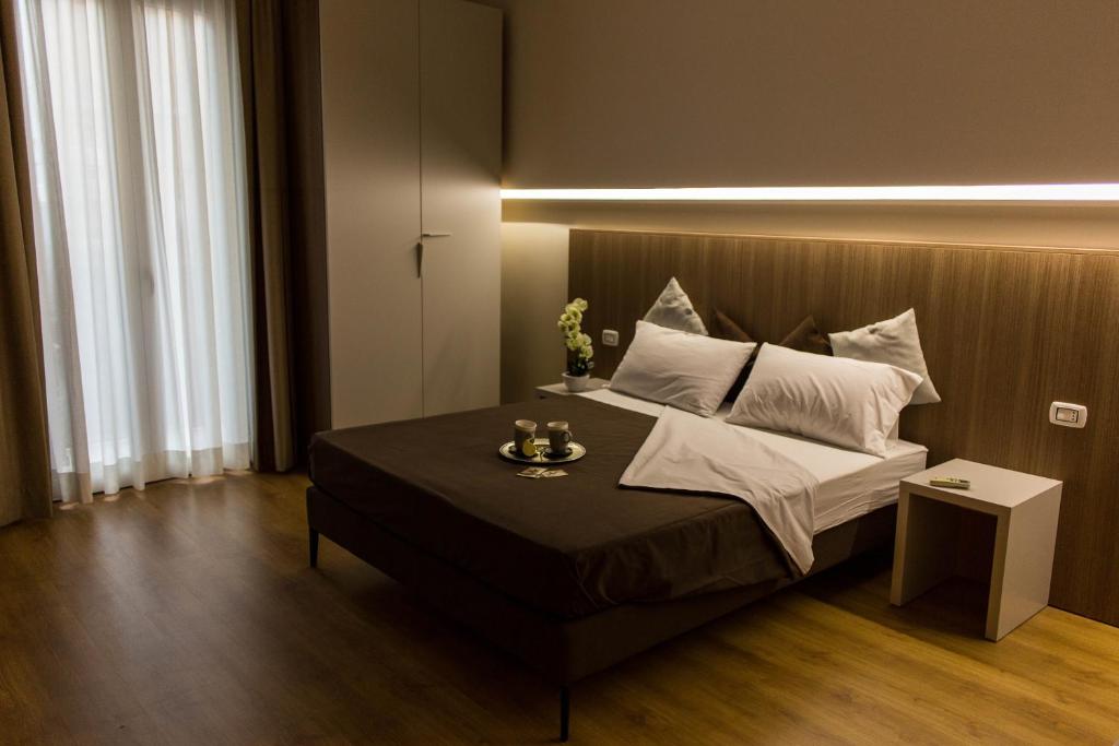 Posteľ alebo postele v izbe v ubytovaní Le Affacciate Bruzie Home Guest House