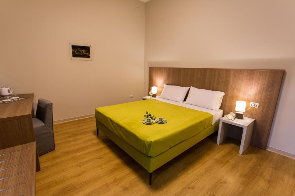 Posteľ alebo postele v izbe v ubytovaní Le Affacciate Bruzie Home Guest House