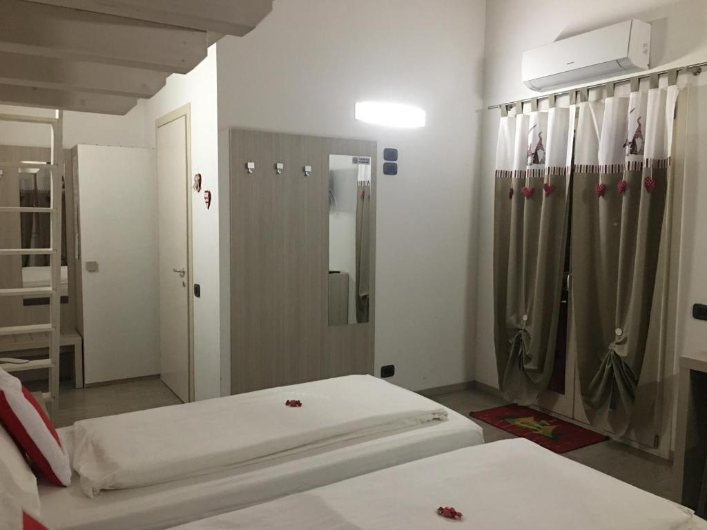 Postel nebo postele na pokoji v ubytování B&B Nuova Ostiglia