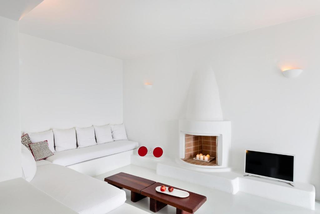 A bed or beds in a room at Aenaon Villas