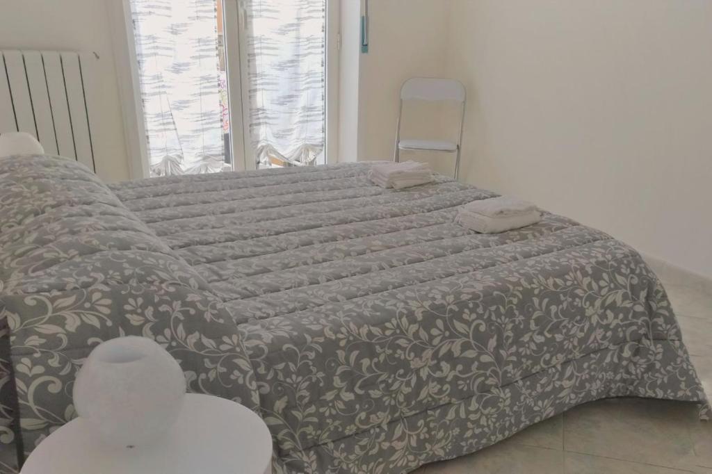 A bed or beds in a room at Il Soffione Home