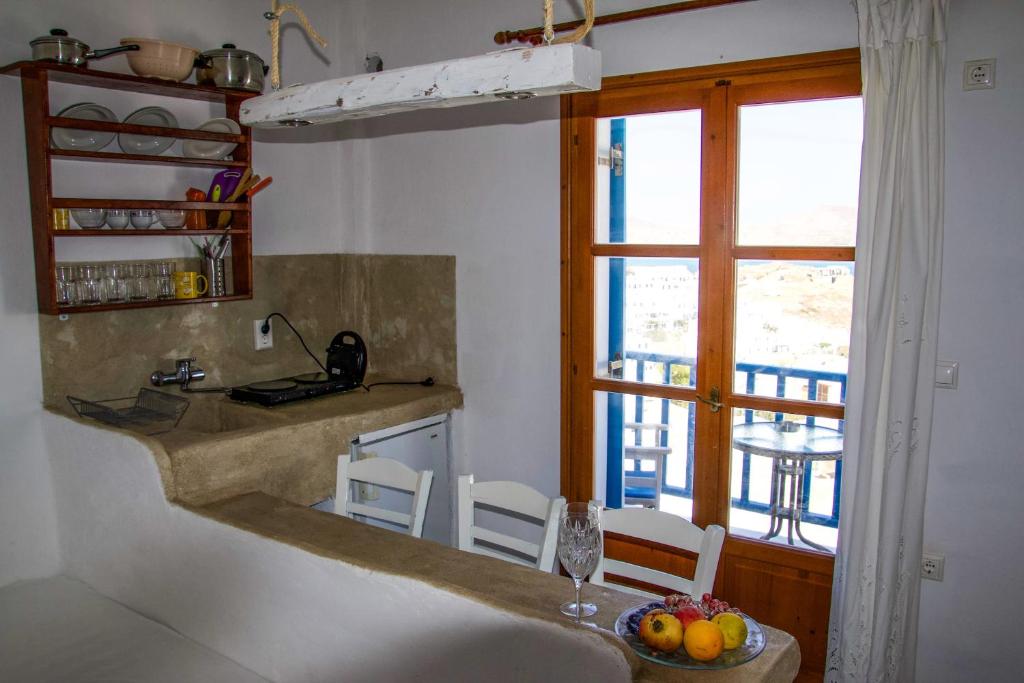Kuchyň nebo kuchyňský kout v ubytování Ioanna Rooms