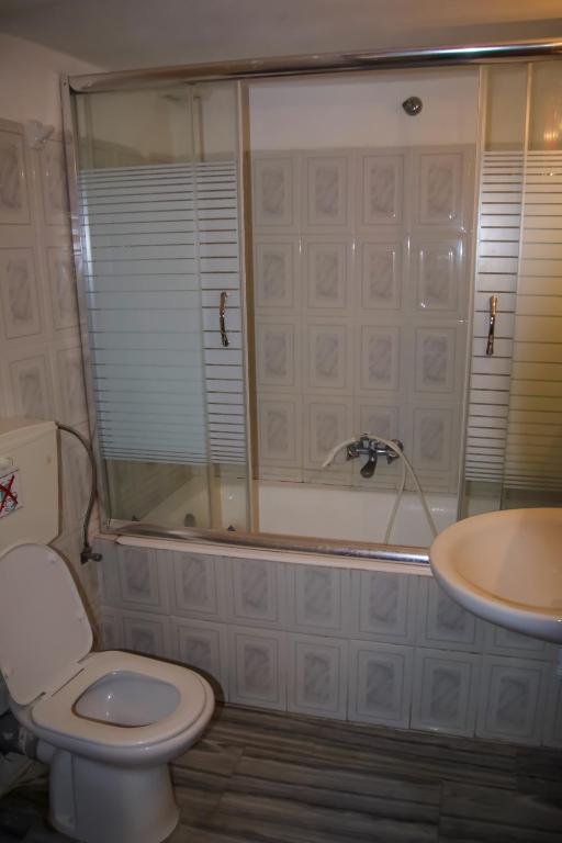 Koupelna v ubytování Ioanna Rooms