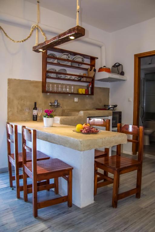 Kuchyň nebo kuchyňský kout v ubytování Ioanna Rooms