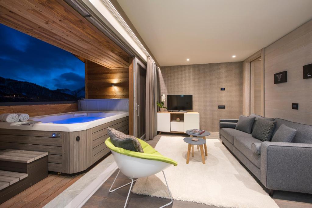 TV a/nebo společenská místnost v ubytování Hotel Principe delle Nevi