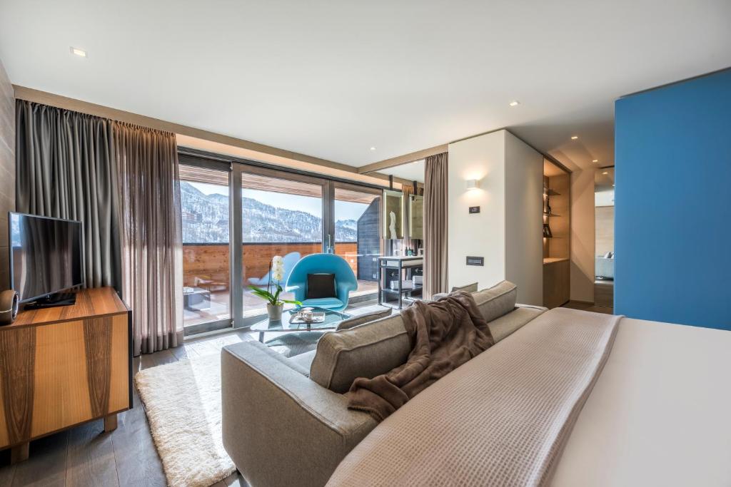 TV a/nebo společenská místnost v ubytování Hotel Principe delle Nevi