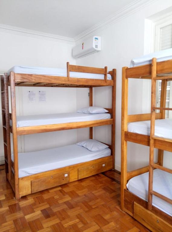 Postel nebo postele na pokoji v ubytování Hostel Casarão 65
