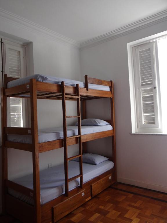 Postel nebo postele na pokoji v ubytování Hostel Casarão 65