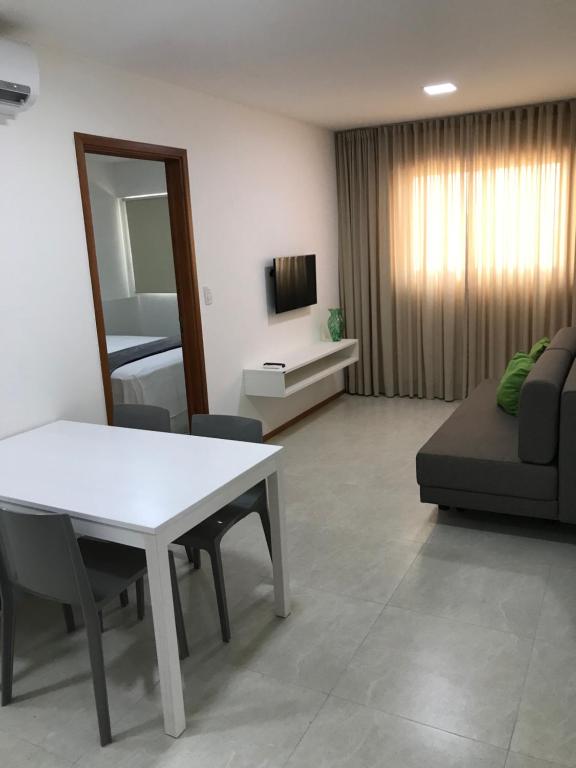 TV a/nebo společenská místnost v ubytování Apartamento Completo Jatiúca