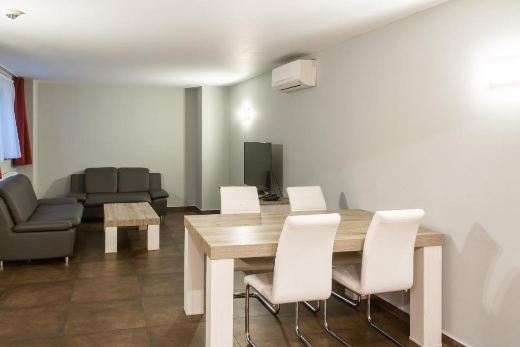 Posezení v ubytování Wellness Apart Hotel