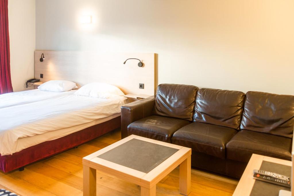 Posezení v ubytování Wellness Apart Hotel