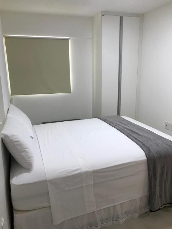 Postel nebo postele na pokoji v ubytování Apartamento Completo Jatiúca
