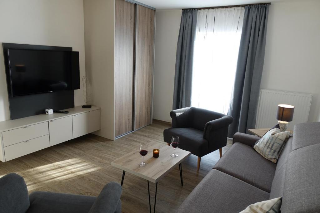 TV a/nebo společenská místnost v ubytování Haus Brunner