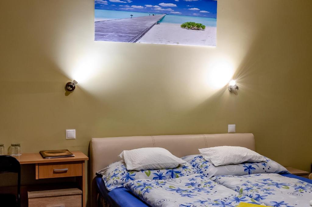 Posteľ alebo postele v izbe v ubytovaní Bástya Hotel