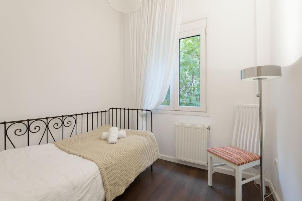 Posteľ alebo postele v izbe v ubytovaní Roman market- upper Aristotelous sq luxury apartment