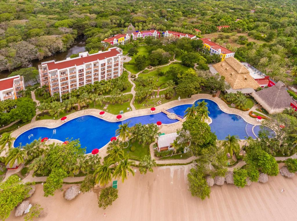 an aerial view of a resort on the beach at Royal Decameron Salinitas - All Inclusive in Los Cóbanos