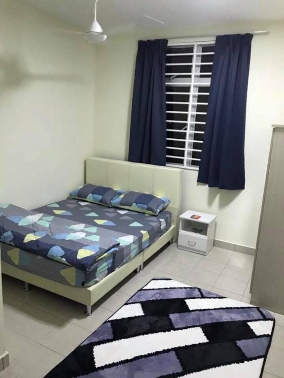 Postel nebo postele na pokoji v ubytování V’Auliya Residence