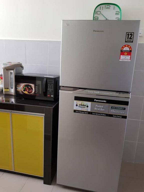 Kuchyň nebo kuchyňský kout v ubytování V’Auliya Residence