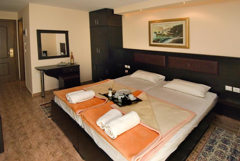 Postel nebo postele na pokoji v ubytování Hotel Dias