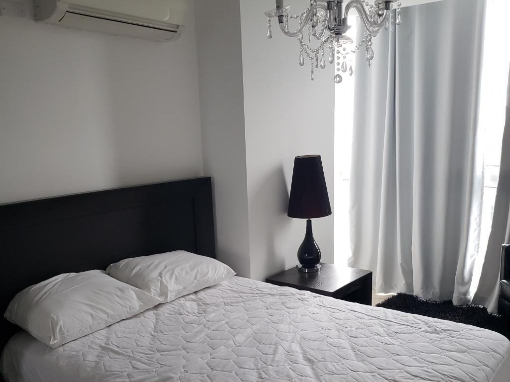 Postel nebo postele na pokoji v ubytování Ibiza Playa Corona
