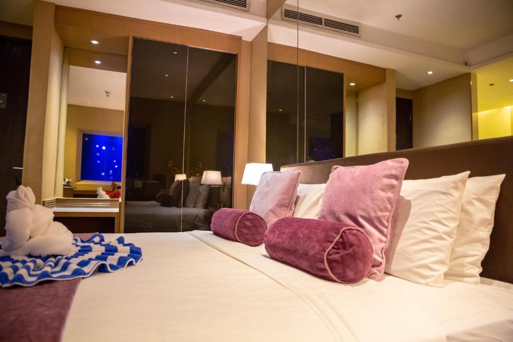 Postel nebo postele na pokoji v ubytování Hotel H2O