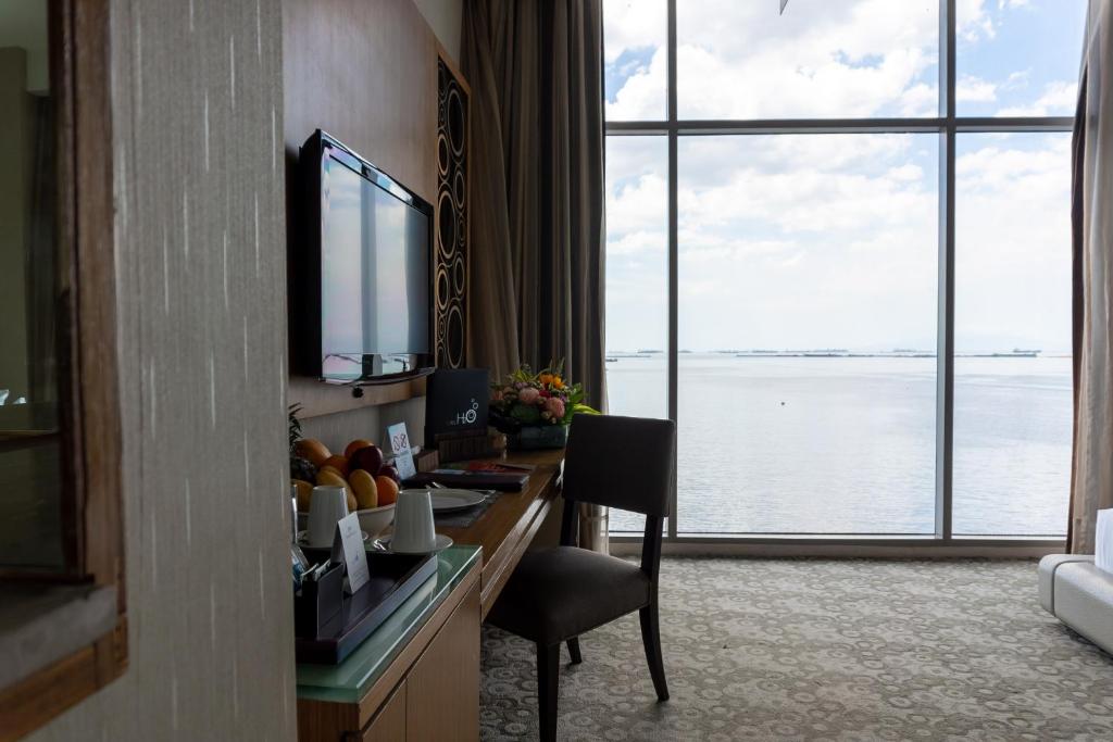 TV a/nebo společenská místnost v ubytování Hotel H2O