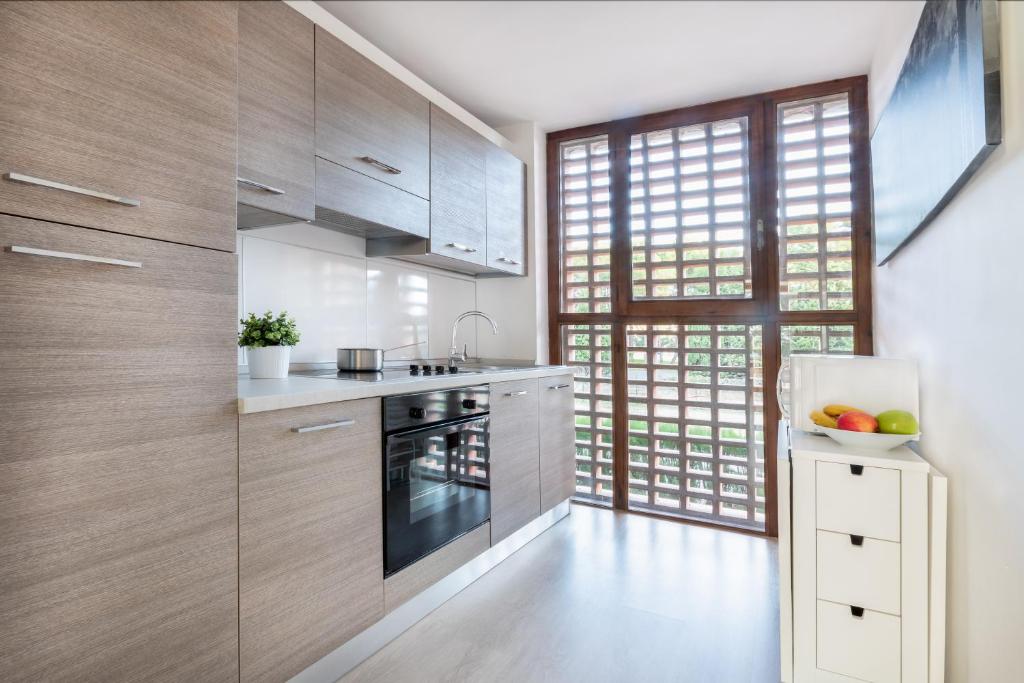 Kuchyň nebo kuchyňský kout v ubytování Agaró Cambrils Apartments