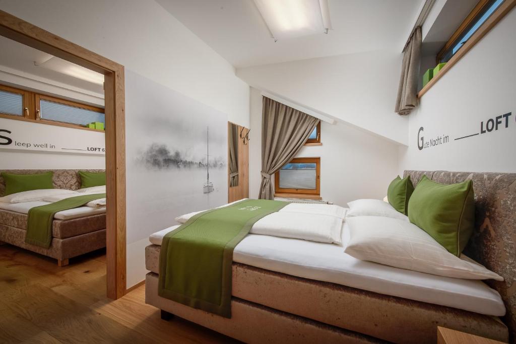 Postel nebo postele na pokoji v ubytování Hotel Fischer