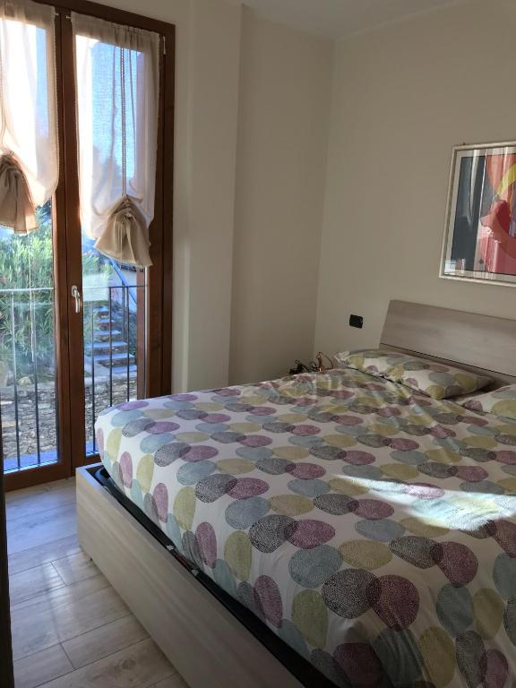 Posteľ alebo postele v izbe v ubytovaní Bellavista Giulia on Lake Como