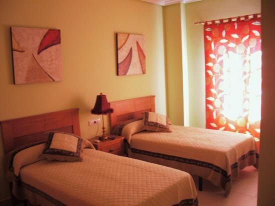 Postel nebo postele na pokoji v ubytování Hostal el mirador