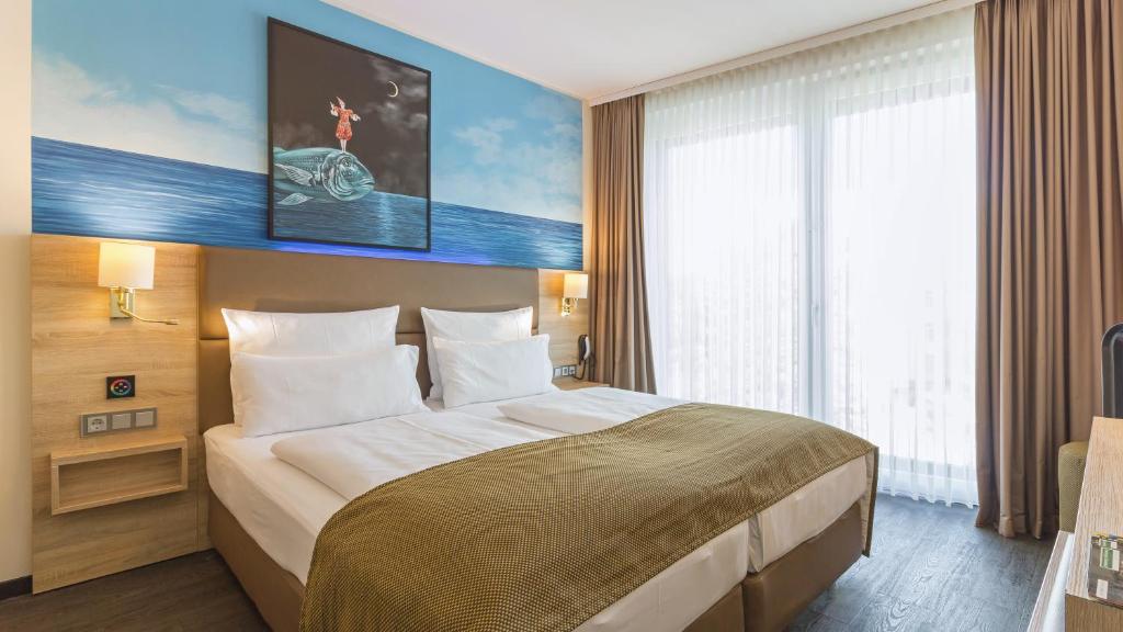 Postel nebo postele na pokoji v ubytování Stay! Hotel Boardinghouse