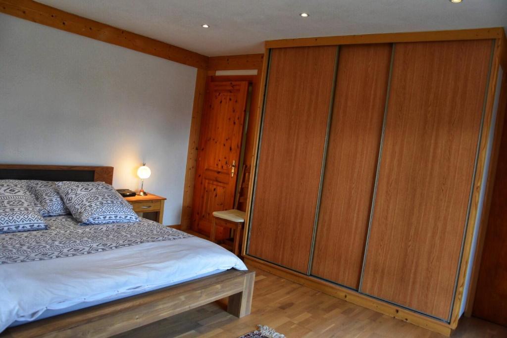 Postel nebo postele na pokoji v ubytování Chalet Belmont