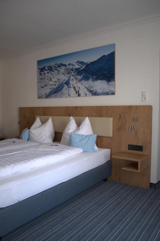 Postel nebo postele na pokoji v ubytování Hotel Wagner