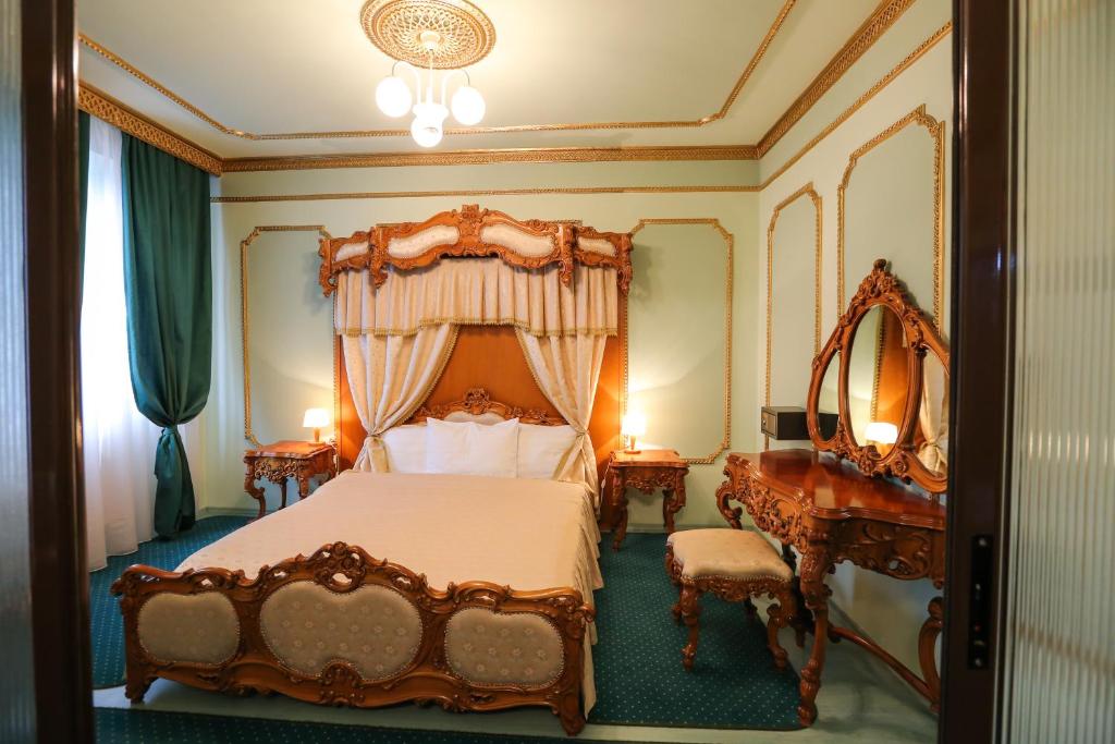 Postel nebo postele na pokoji v ubytování Hotel Kreta