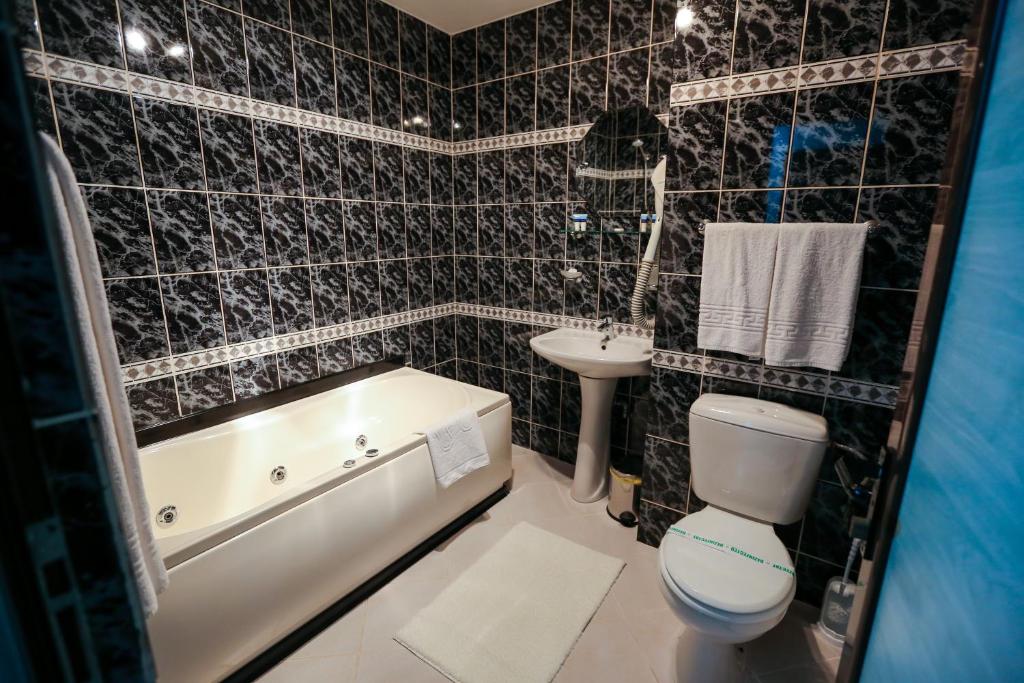 Koupelna v ubytování Hotel Kreta