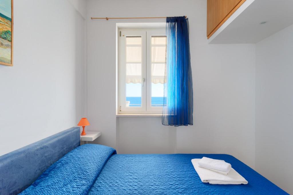 Postel nebo postele na pokoji v ubytování Marinaia - Casa Alba