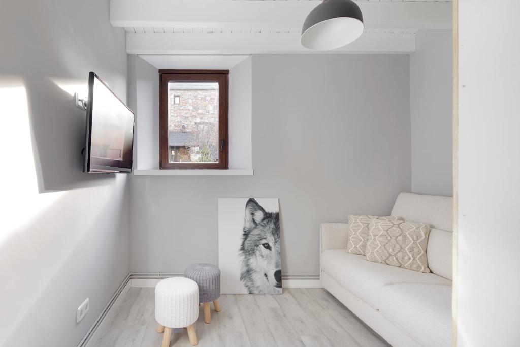 Televízia a/alebo spoločenská miestnosť v ubytovaní Era Cuma by FeelFree Rentals