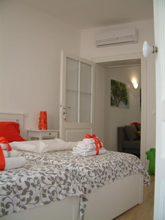 En eller flere senge i et værelse på Casa vacanza Piazza Marconi