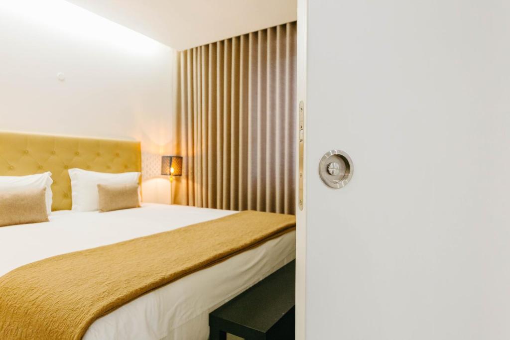 Postel nebo postele na pokoji v ubytování Lisbon Avenue Marquês - Luxury Apart