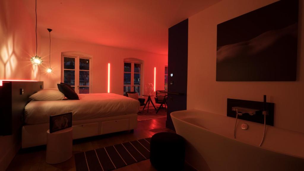 Postel nebo postele na pokoji v ubytování MiHotel Vieux Lyon