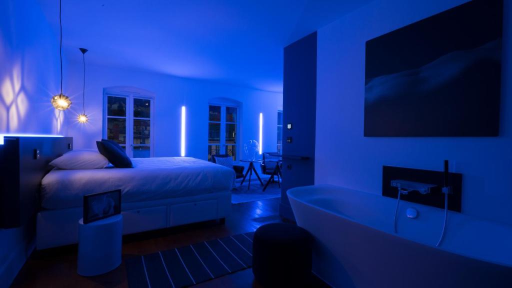Postel nebo postele na pokoji v ubytování MiHotel Vieux Lyon
