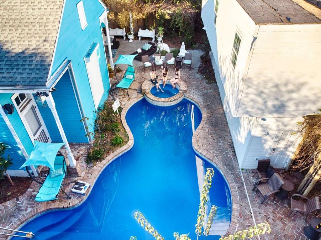 an overhead view of a swimming pool at a resort at Five BR - Sleeps 10! Steps from French Quarter in New Orleans