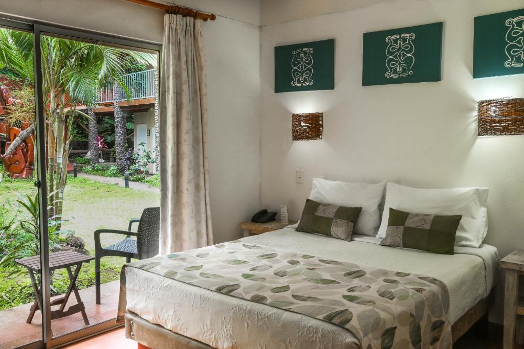 Postel nebo postele na pokoji v ubytování Easter Island Ecolodge