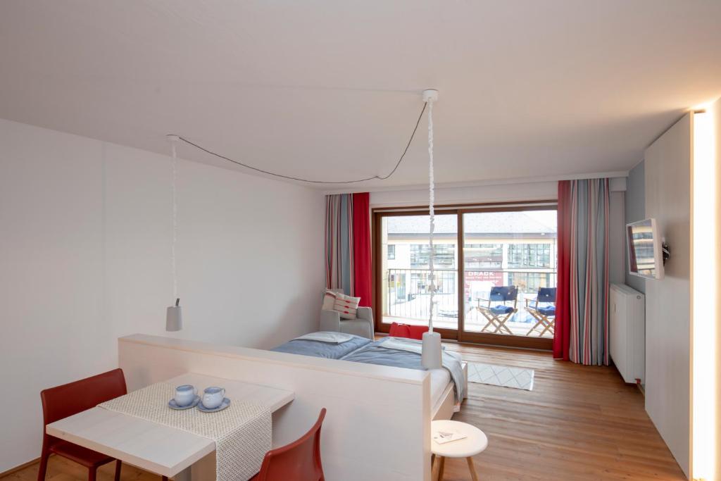 Postel nebo postele na pokoji v ubytování Frauscher Hafen-Apartments